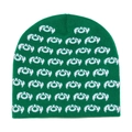 Gedetailleerde gebreide textuur en groen monstertanden jacquardpatroon op de wintermuts - M (56-58cm) / Groen
