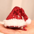 Glittery red Santa hat hair clip for Christmas with plush trim and metal alligator base - Soft Hat Clip