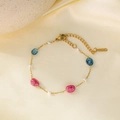 Golden stainless steel bracelet with blue and pink stones and micro pearls - Pearl and Colorful Stone Bracelet - Gold