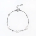 Close-up of delicate pearl chain bracelet with stainless steel beads and lobster clasp - Three Pearls Accent / Silver