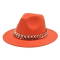 Detail of orange fedora hat featuring thick gold acrylic chain on felt brim - Orange