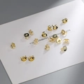 Golden S925 sterling silver earring back replacements in a bulk professional display - Gold