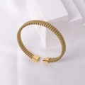 Macro detail of gold mesh woven cuff bracelet on silk fabric with rectangle ends - Gold 2