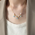 Goldkette mit Perlen und bösem Blick Anhängern für Damen im Boho-Stil Design - 40+5cm / Gold