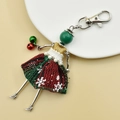 Detail of handmade Christmas character keychain with green beads and red plaid skirt - 08-Christmas Red Green Dress