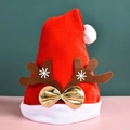Red plush Christmas hat with brown reindeer antlers and gold bows on a pink surface - Adult Thickened Antlers Hat-Coffee