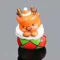 Brown reindeer squishy toy in Christmas sock with Santa hat and 9.4x6.4cm size - Christmas Reindeer Blue