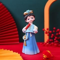 Close-up of a resin Hanfu girl figurine holding Tanghulu with traditional Chinese decor - B145 Sugar-coated Haws - Small