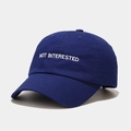 Detail of white embroidery text on a navy blue cotton baseball cap with clean stitching - M(56-58cm) / Blue