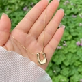 Polished 18K gold plated U-shaped letter pendant on a delicate snake chain - Gold U