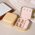 Portable pale yellow square jewelry storage box with zip closure and internal compartments - Gold