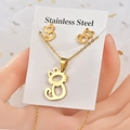 Gold stainless steel jewelry set featuring cat silhouette necklace and stud earrings - Gold Cat