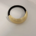 Minimalist golden crescent metal hair tie with grid texture on black elastic band - Curved Small Grid Gold