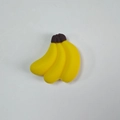 Bananenförmiger Kabelschutz für iPhone und Android aus leuchtend gelbem Silikon - Banane