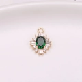 Colgante de girasol dorado con gema ovalada verde y detalles de circón blanco - Verde Pavo Real