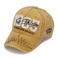 Close-up of vintage mustard baseball cap featuring 3D 1985 embroidery and distressed details - One Size (56-60cm Adjustable) / Ginger Yellow (1985 Style)