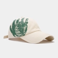 Détail de l'imprimé palmier vert et du bord usé sur la casquette de couleur beige - Réglable / Beige