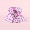 Reversible bucket hat featuring stylish pink cow print on durable cotton canvas - Rose Red