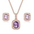 Detail view of rose gold jewelry set featuring purple gemstones and white zirconia - Rose Gold + Purple Stone Set