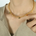 Gold rope chain necklace with five colorful round zircon charms worn by model - Gold Round