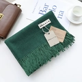 Deep green cashmere-like scarf with fringe tassels shown on a minimalist white background - Dark Green / 200cm