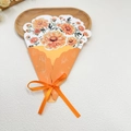Detail of 3D bouquet card featuring orange chrysanthemums and a silk ribbon bow knot - Chrysanthemum