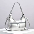 Detail of silver crescent moon shoulder bag featuring smooth metallic finish and zip pocket - Silver