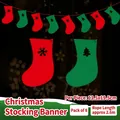 Christmas felt bunting banner featuring red and green socks with snowflake cutouts - Thick Felt (Sock Flags)
