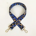 Adjustable royal blue leopard print woven bag strap with golden metal hardware clips - Klein Blue