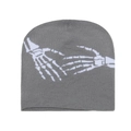 Detailed knit texture of grey beanie featuring white skeleton hands jacquard pattern - Gray