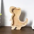Detailed view of dinosaur shaped wooden piggy bank with clear acrylic front panel - Dinosaur