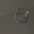 Bague ouverte papillon réglable en argent avec pavé de zircons étincelants style chic - Bague nœud argentée
