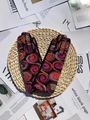 Knitted suede gloves in black with colorful spiral embroidery and ribbed cuffs - One Size / Pink Purple/Orange Green Jacquard