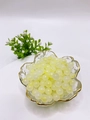 Detailed view of 8mm yellow glass beads for DIY jewelry making in a decorative bowl - 14# Nutmeg Yellow