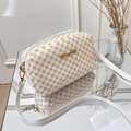 White square crossbody camera bag with yellow circle pattern and gold metal hardware - Diamond White