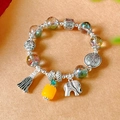 Ethnic beaded bracelet with silver elephant pendant and colorful faceted crystal beads - Elephant Style Transparent Colored Crystal Bracelet