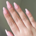 Glossy almond shaped long press-on nails in soft pink finish for elegant hand look - Almond Shape / Glossy Pink