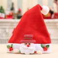 Cappello di Natale rosso per bambini con Babbo Natale in feltro e decorazioni di agrifoglio - Babbo Natale