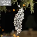 Feather shaped clear acrylic Christmas pendant with gold glitter, size 13.5x5x0.5cm - Feather Style