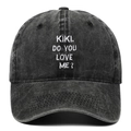 Detailed close-up of white KIKI DO YOU LOVE ME embroidery on washed black cotton cap - Black