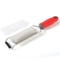Handheld stainless steel cheese grater with ergonomic red handle and protective cover - Bag Packaging / Red