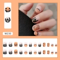 Detail view of W230 Halloween press on nails with pumpkin, ghost, and spider web designs - Pumpkin Nail Art (W230) / Glue Type