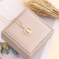 18K gold plated copper necklace with a zircon-encrusted Virgin Mary pendant on a beige box - Round Micro-pave Clear Zircon Style (4#)