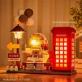 Astronaut in telephone booth micro building blocks set with LED light and 2188 pieces - 6911 Romantic Space Encounter Astronaut with Light