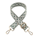 Close-up of green and white ethnic jacquard strap with golden swivel hook - Beige/Peacock Green White