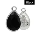 Black teardrop pendant with silver base and floral relief carving on the back - Black