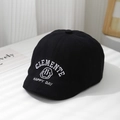 Gros plan de la casquette gavroche en coton noir avec broderie smiley blanche pour enfant - 52cm (2-5 Ans) / Noir