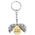 Detail of opening sunflower keychain with You Are My Sunshine engraving on gold plate - T00001 Silver Shell Gold Disc (You are my sunshine)