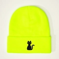 Close-up of black cat embroidery on fluorescent green knitted beanie hat with fold-up cuff - Neon Yellow