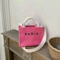 Pink woven straw tote bag with black PARIS print and long cream shoulder strap - Small Rose Red